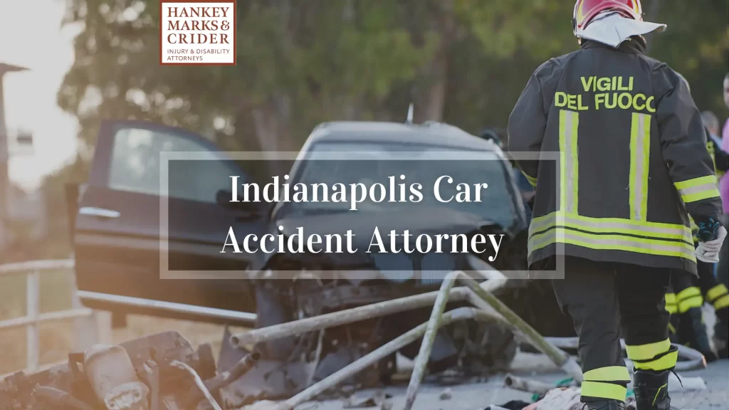 Indianapolis Car Accident Attorney, fireman walking to the scene of a car accident