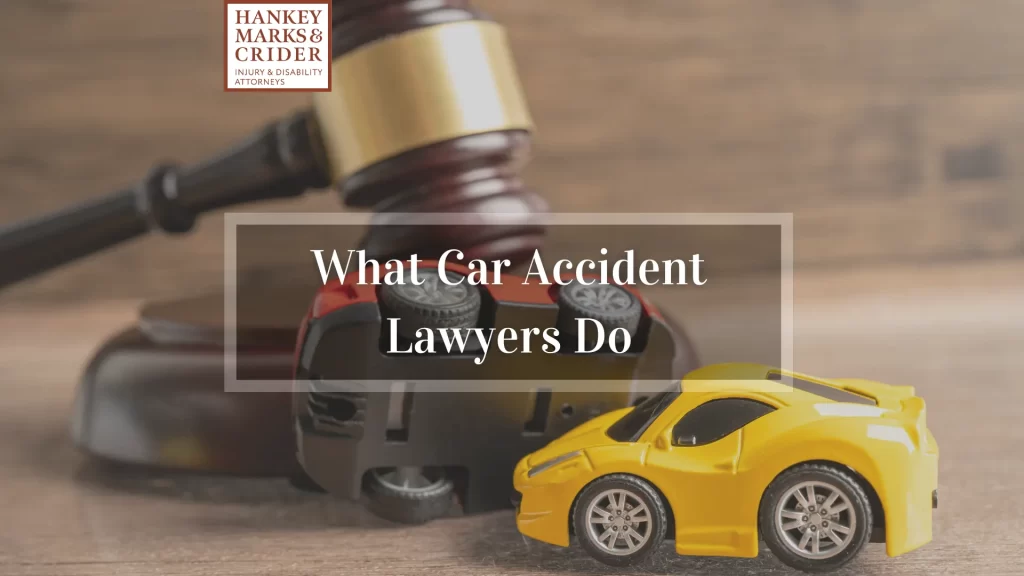 what car accident lawyers do, gavel of justice with 2 toy cars in a collision by the side of it